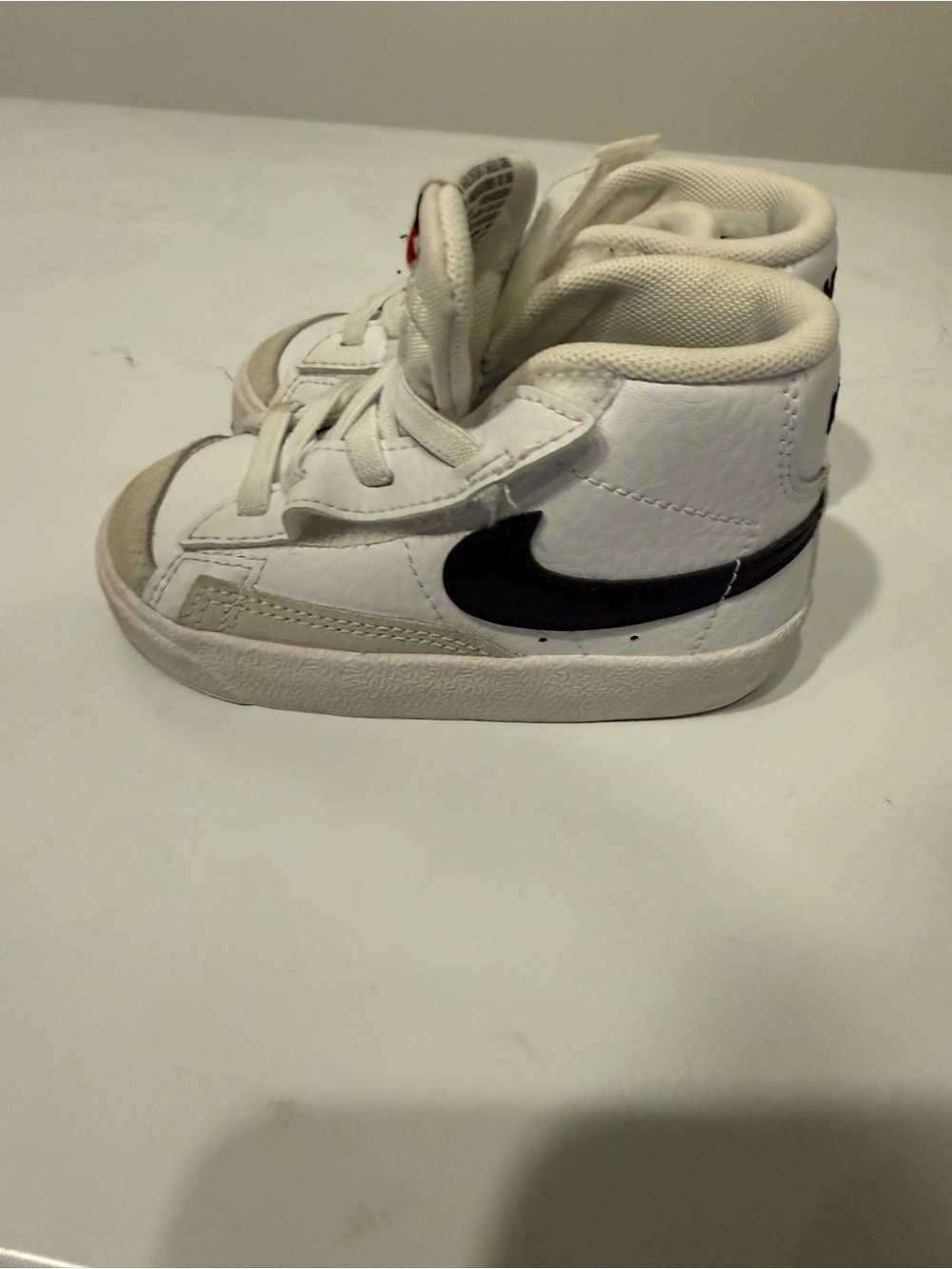 Nike Kids White High-Top Sneakers with Black Swoosh